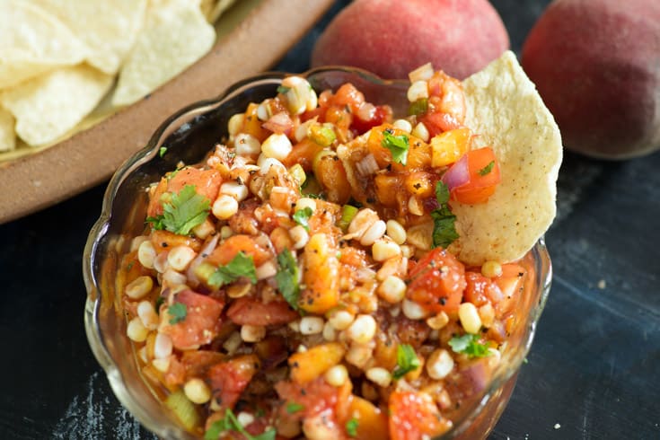 A bowl of Corn and Peach Salsa