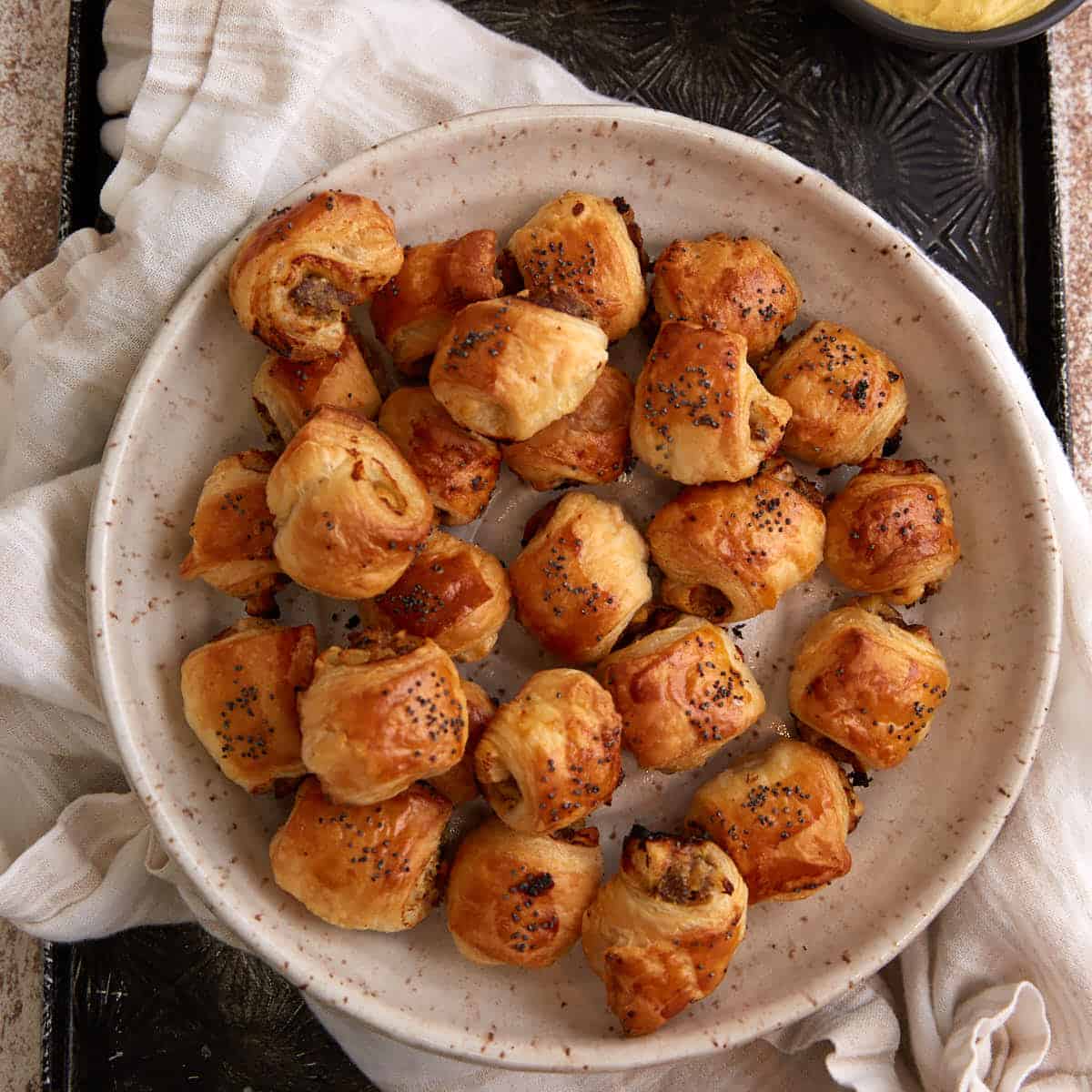 A platter of apple sausage rolls.