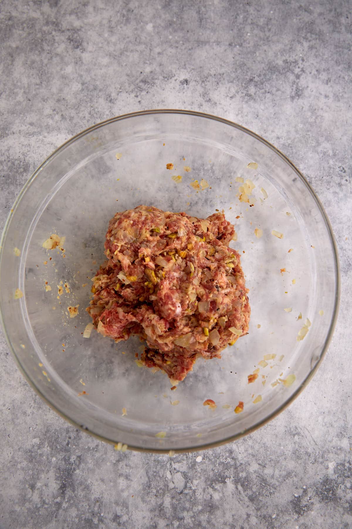 The filling for sausage rolls in a bowl.