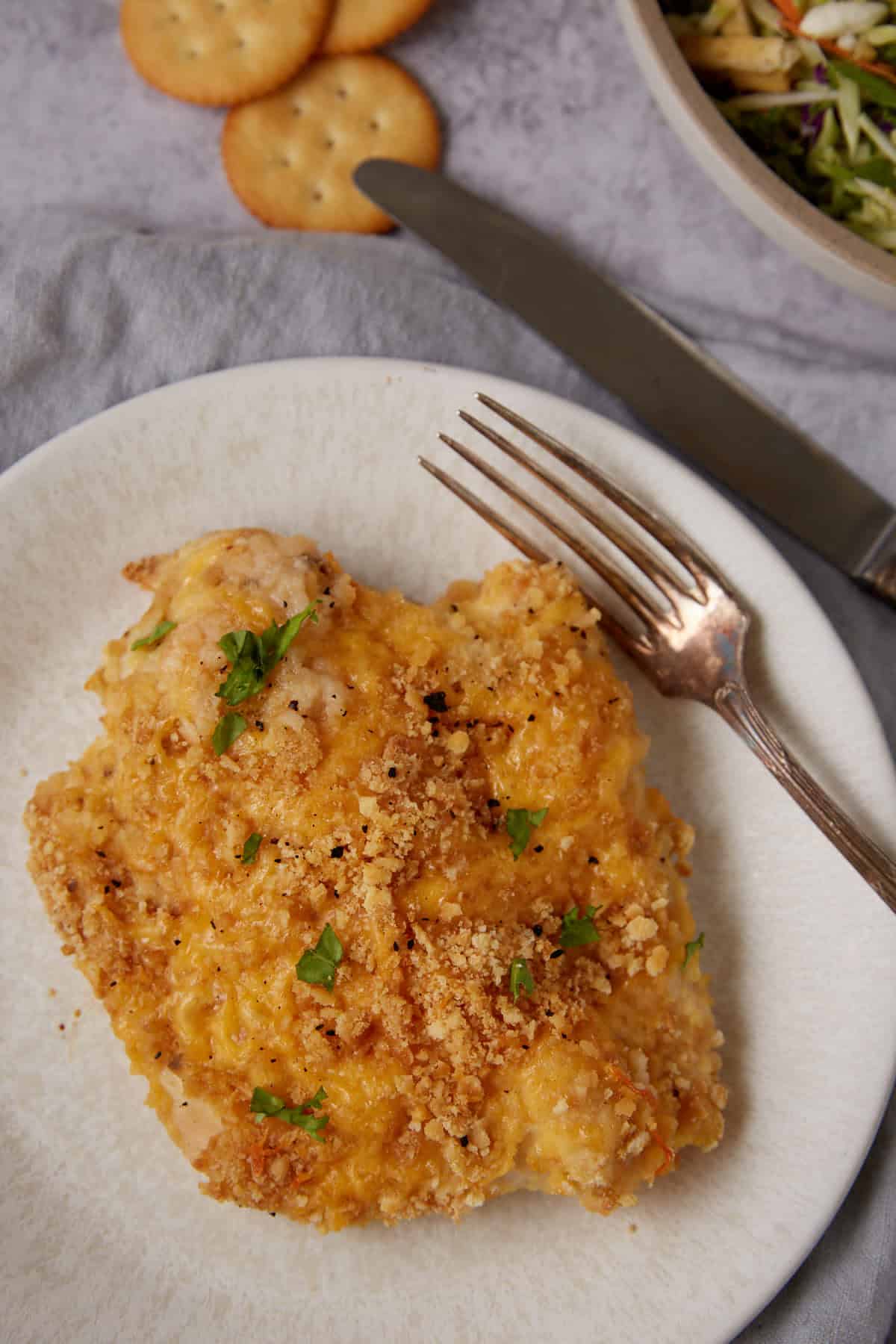 A plate of baked ritz chicken.