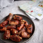 A platter of grilled stuffed dates.