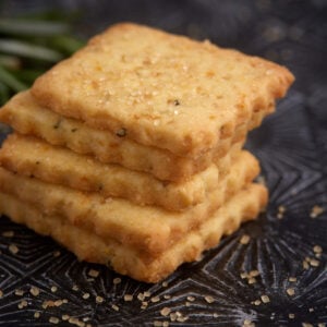Stacked shortbread cookies on a serving tray.