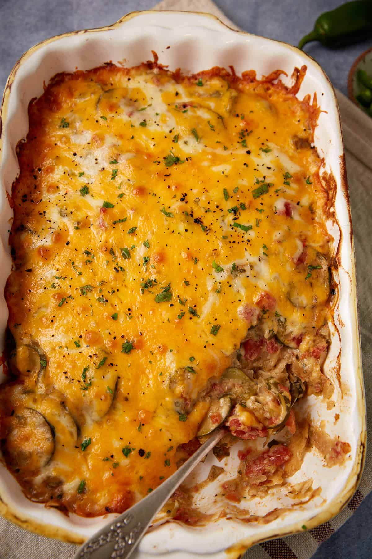 A baking dish with Tex- Mex squash casserole.