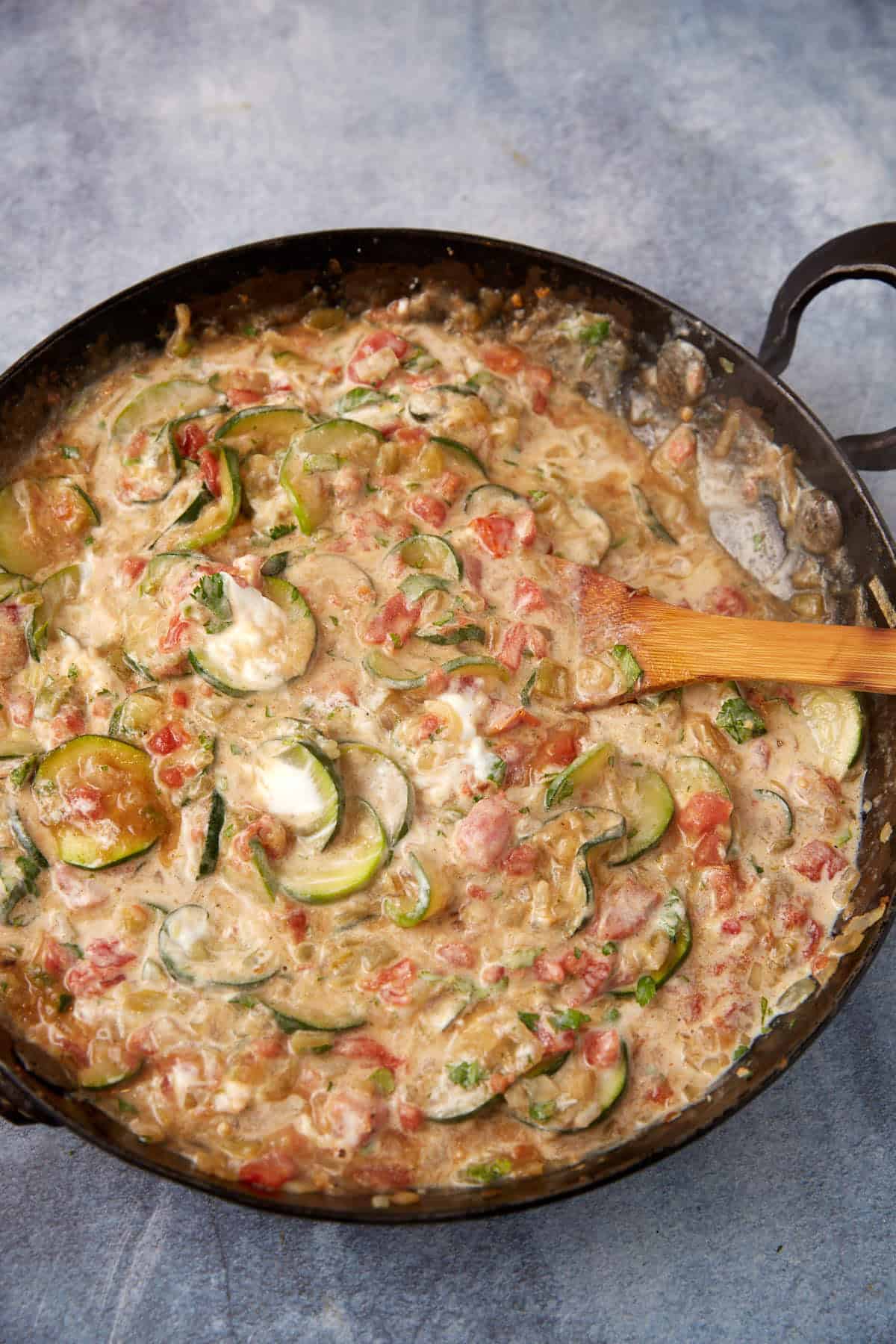 Sour cream added to the squash mixture.