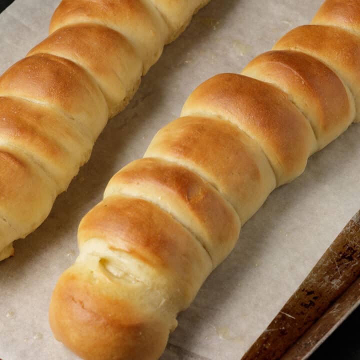 Two rows of Parker House rolls.