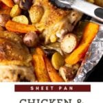 A sheet pan of baked chicken and potatoes with carrots.