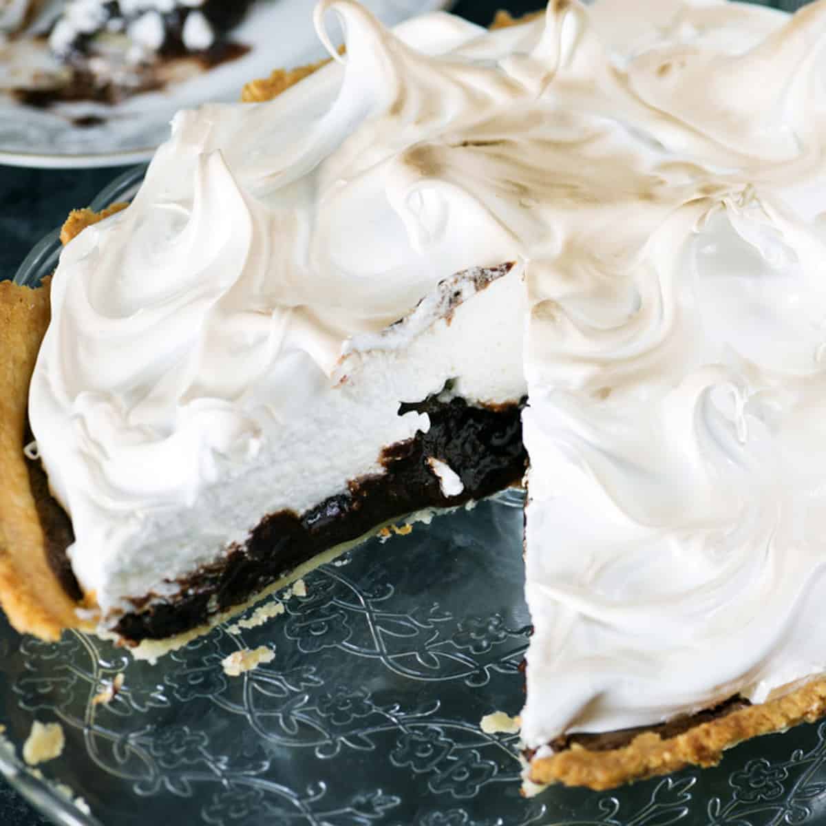 Chocolate pie with a marshmallow topping in a pie dish.