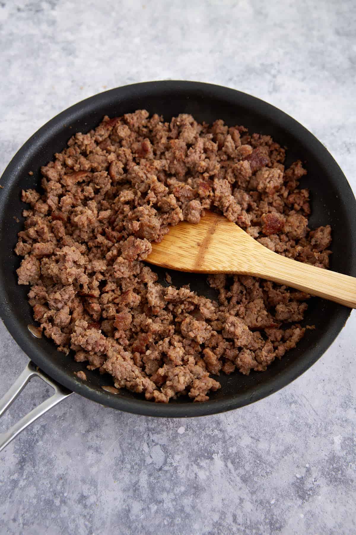 Sausage cooked in a skillet.