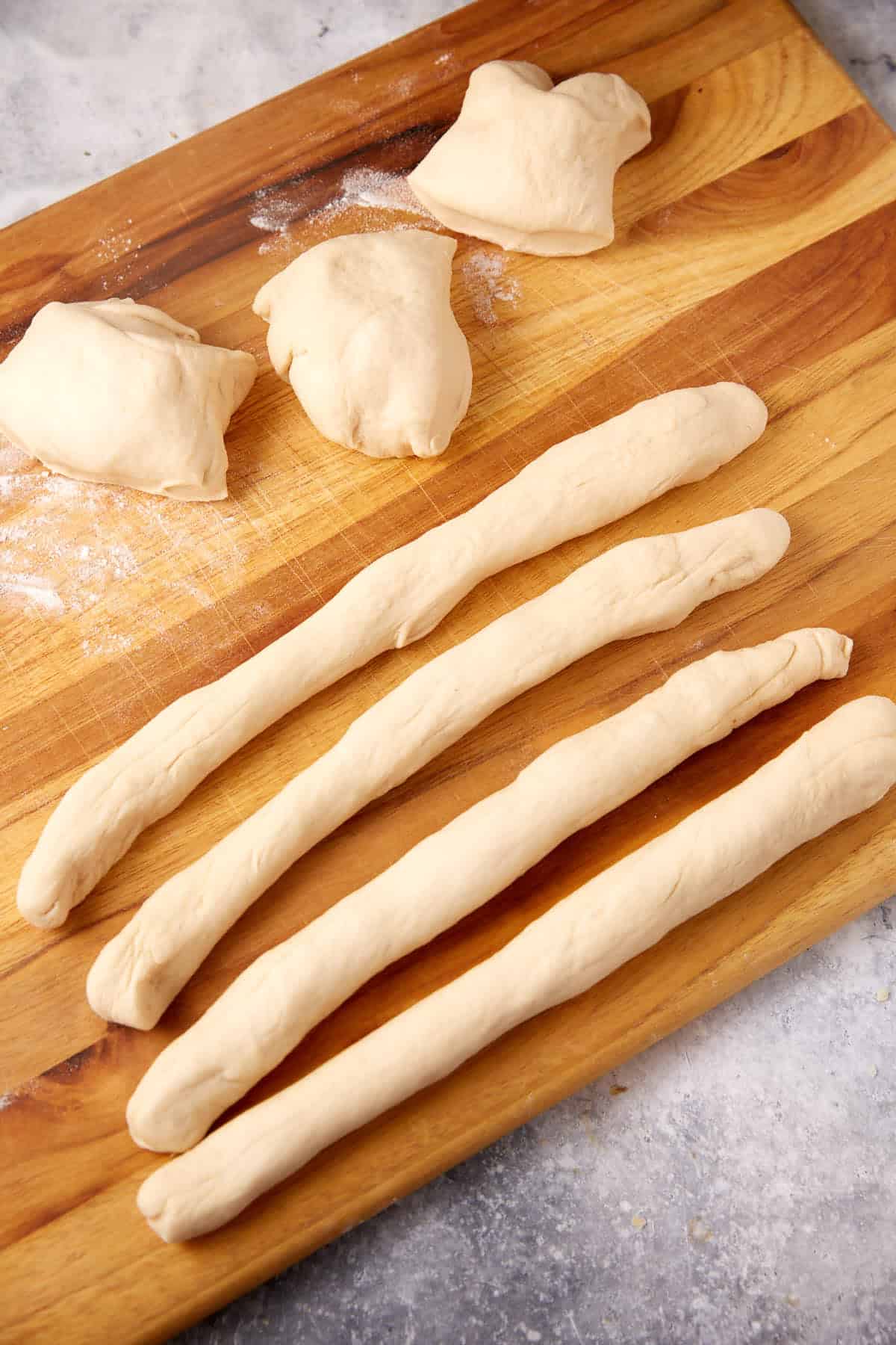 Pretzel dough, rolled into strips.