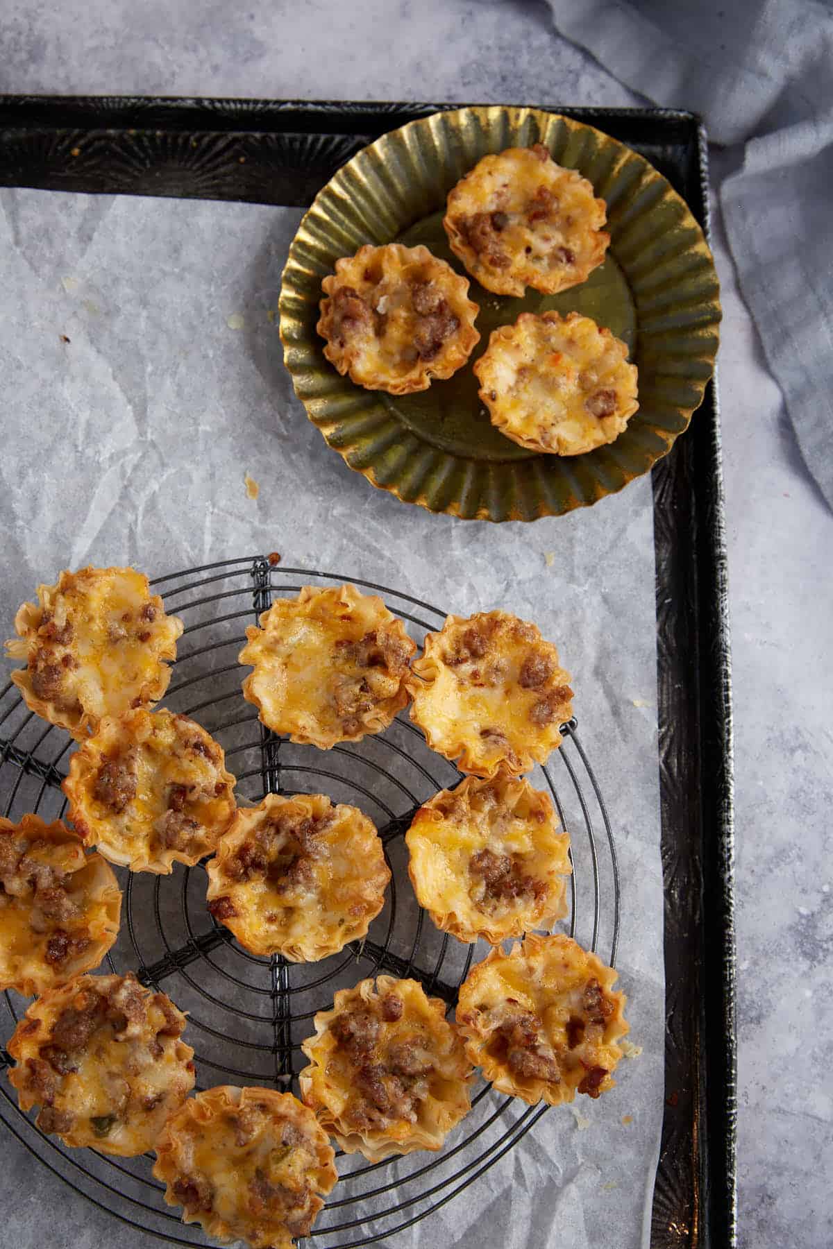 A platter of sausage cups.