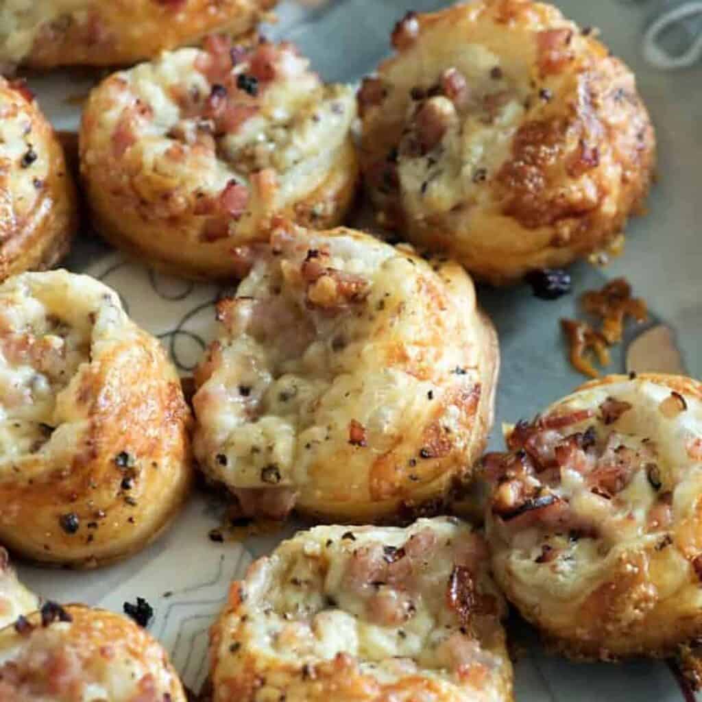 A platter of mini croque Monsieur appetizers.