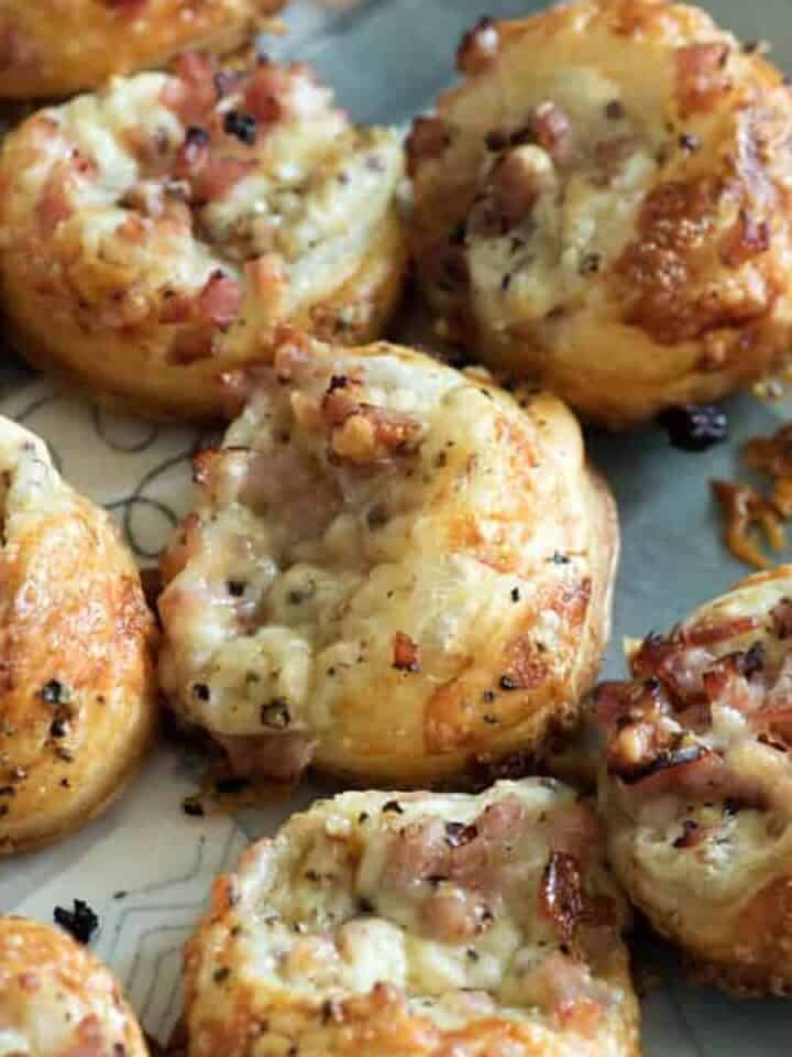 A platter of mini croque Monsieur appetizers.