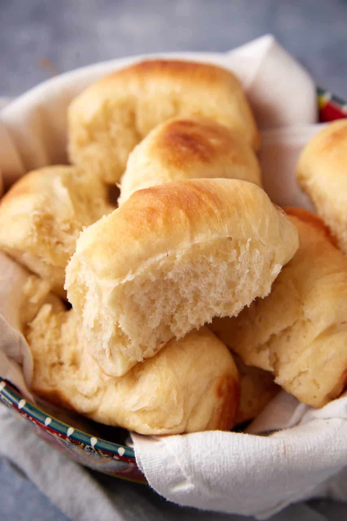 yeast rolls in a bread basket.