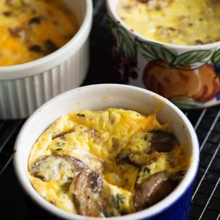 Ceramic cups of baked eggs.