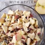 A bowl of classic Waldorf Salad in a glass bowl.