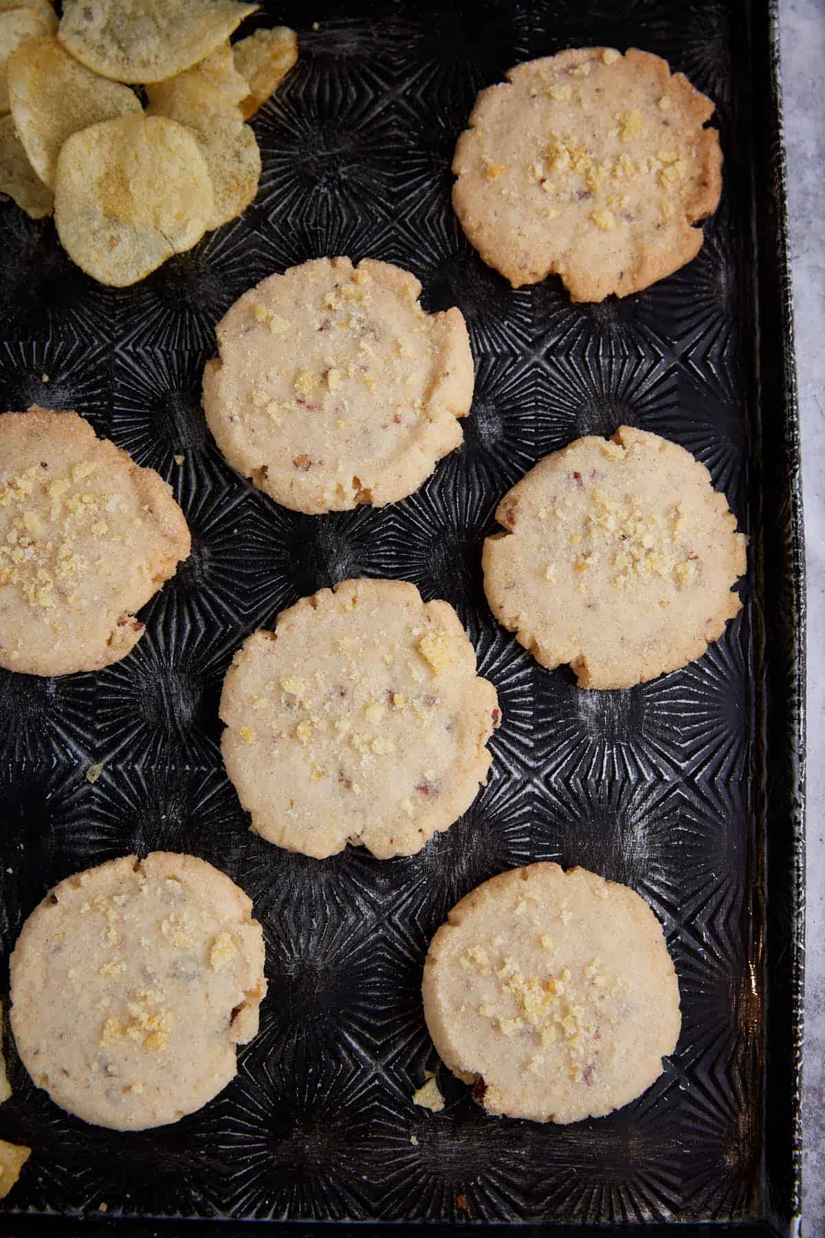 A baking sheet of potato chip cookies.