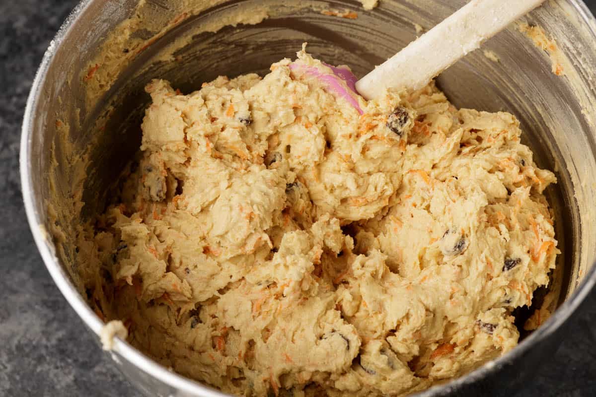 Carrot cake cookie dough in a mixing bowl.