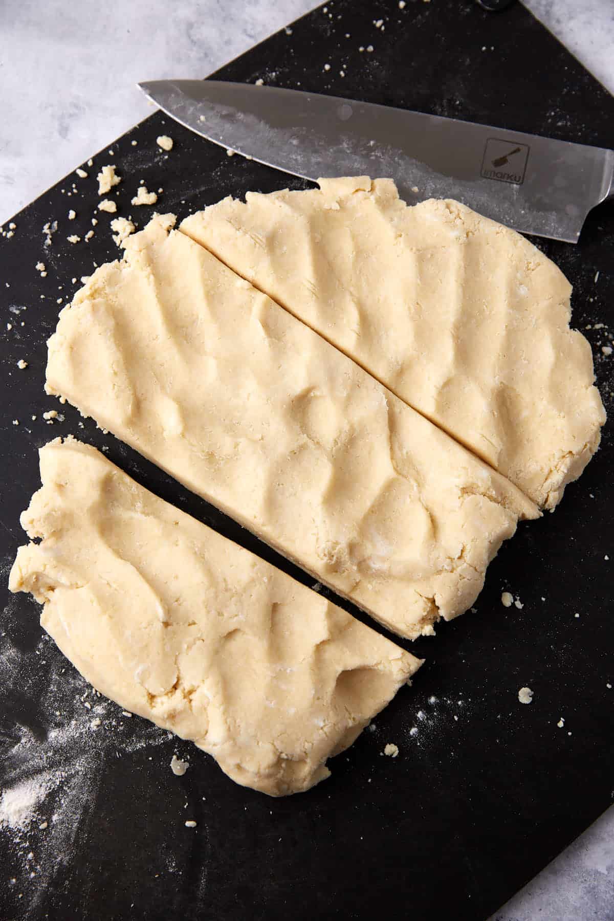 Scone dough cut into thirds.