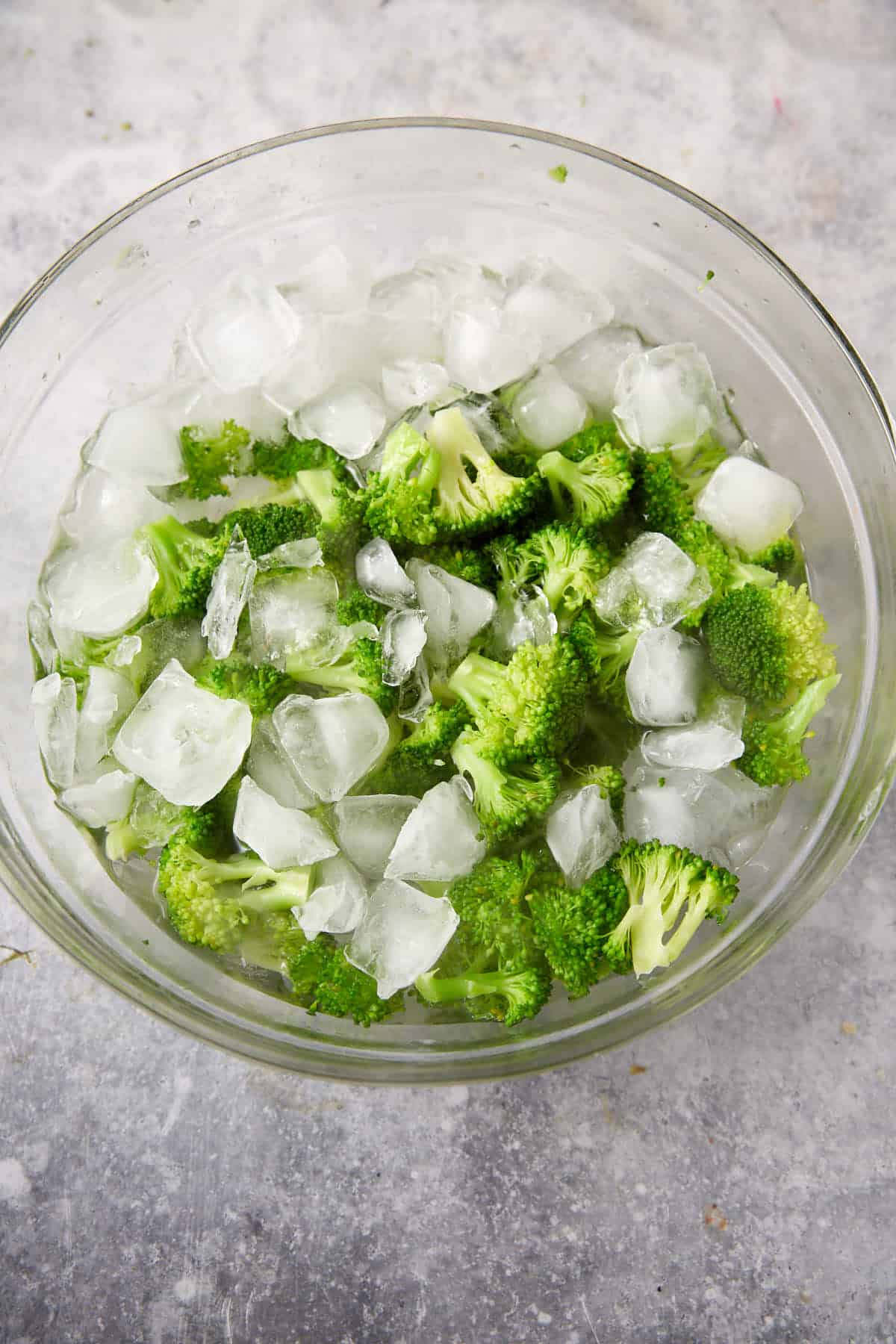 Broccoli in a bowl of ice.