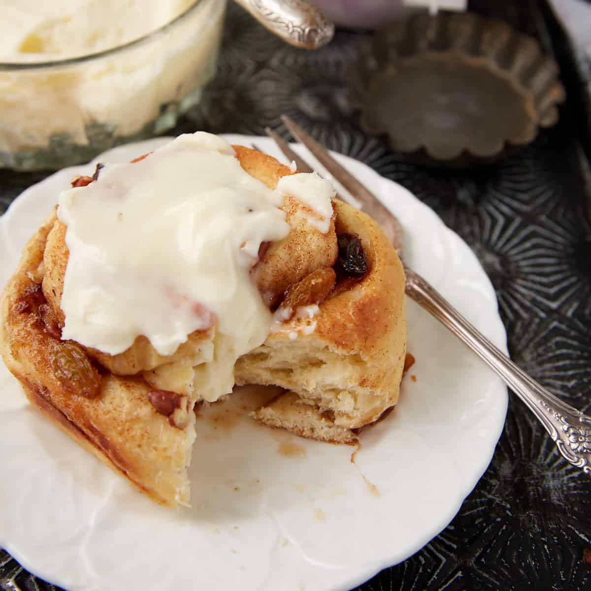 A frosted Hawaiian cinnamon roll with cream cheese frosting.