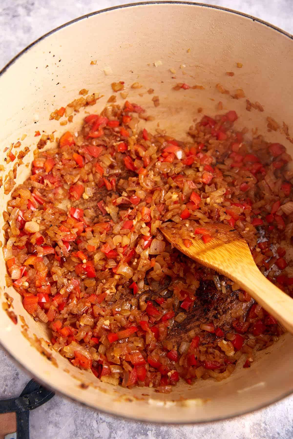 Cooked veggies in a Dutch oven.