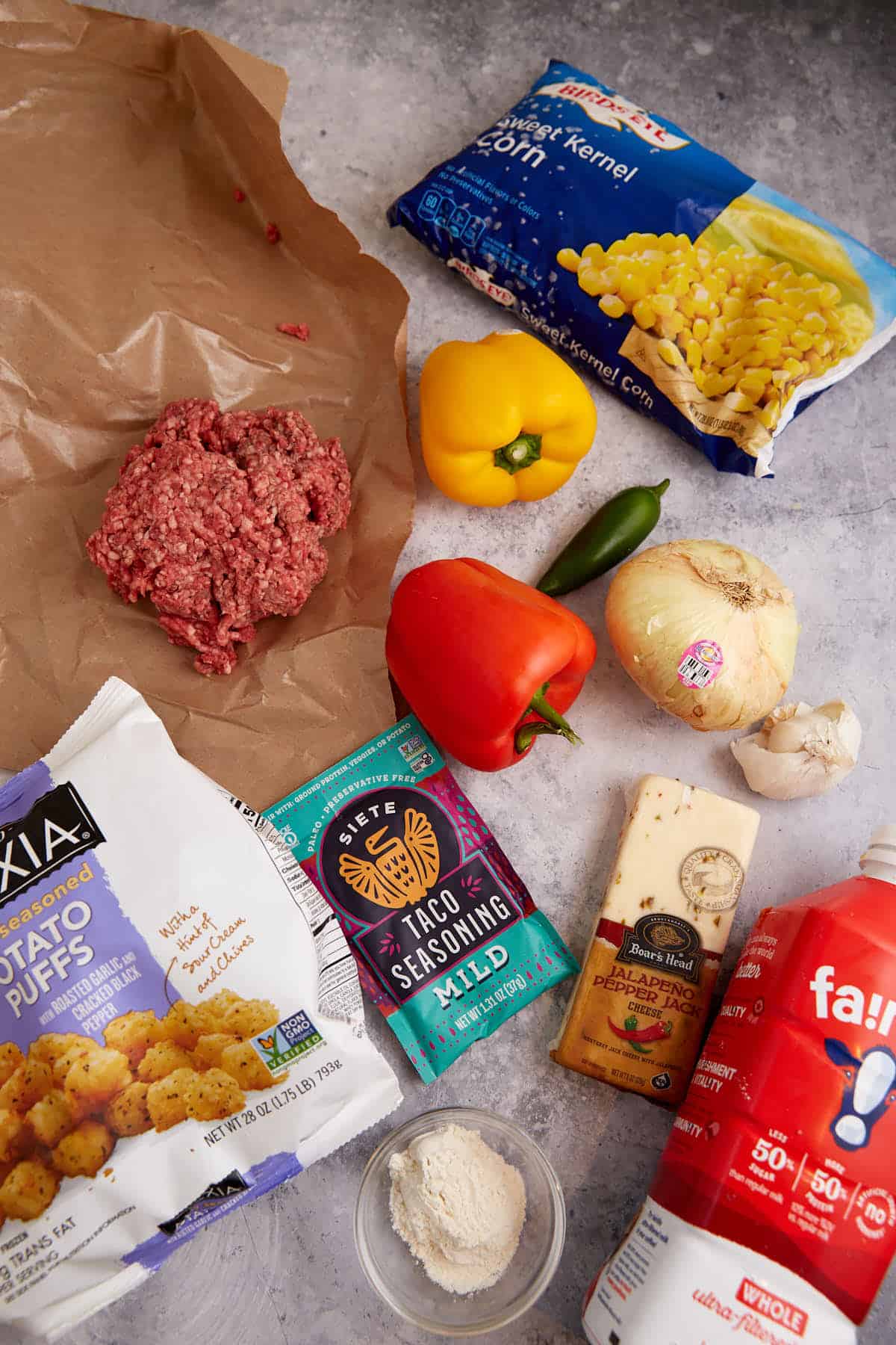 The ingredients for a hamburger tater tot casserole.