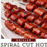 Spiral cut hot dogs on a serving platter.