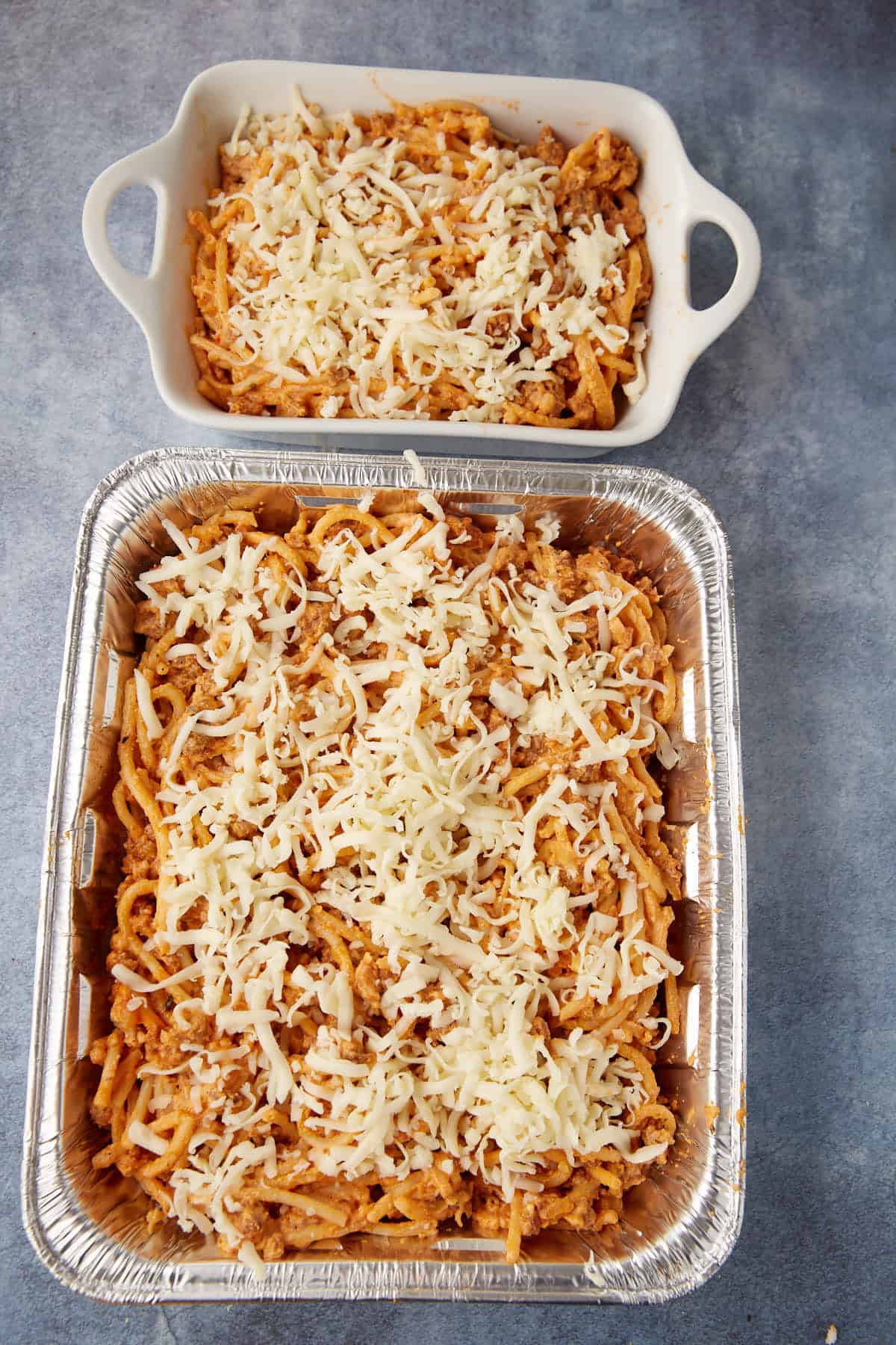 Cheese covering a spaghetti casserole.