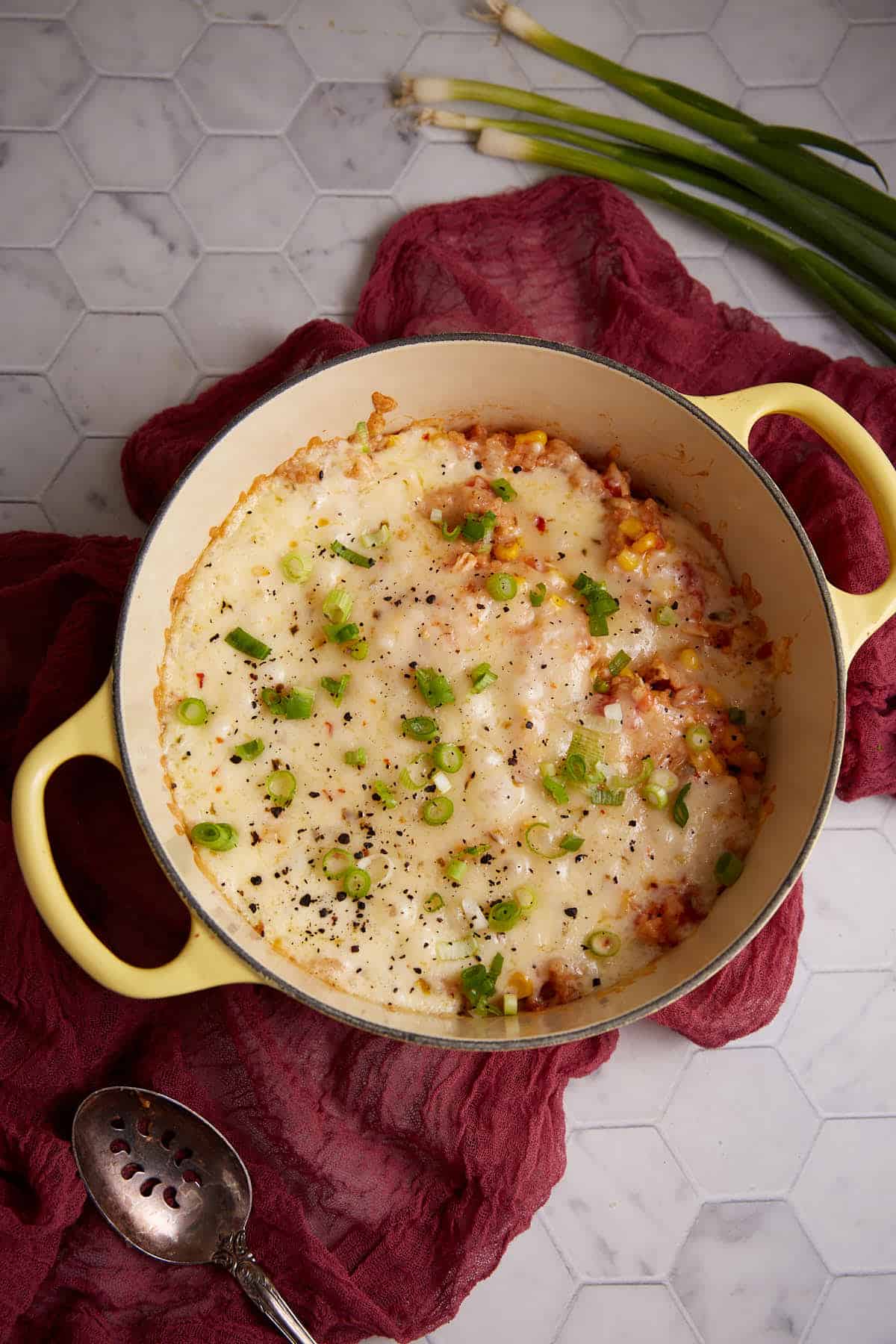 A cooked pot of chicken and rice.