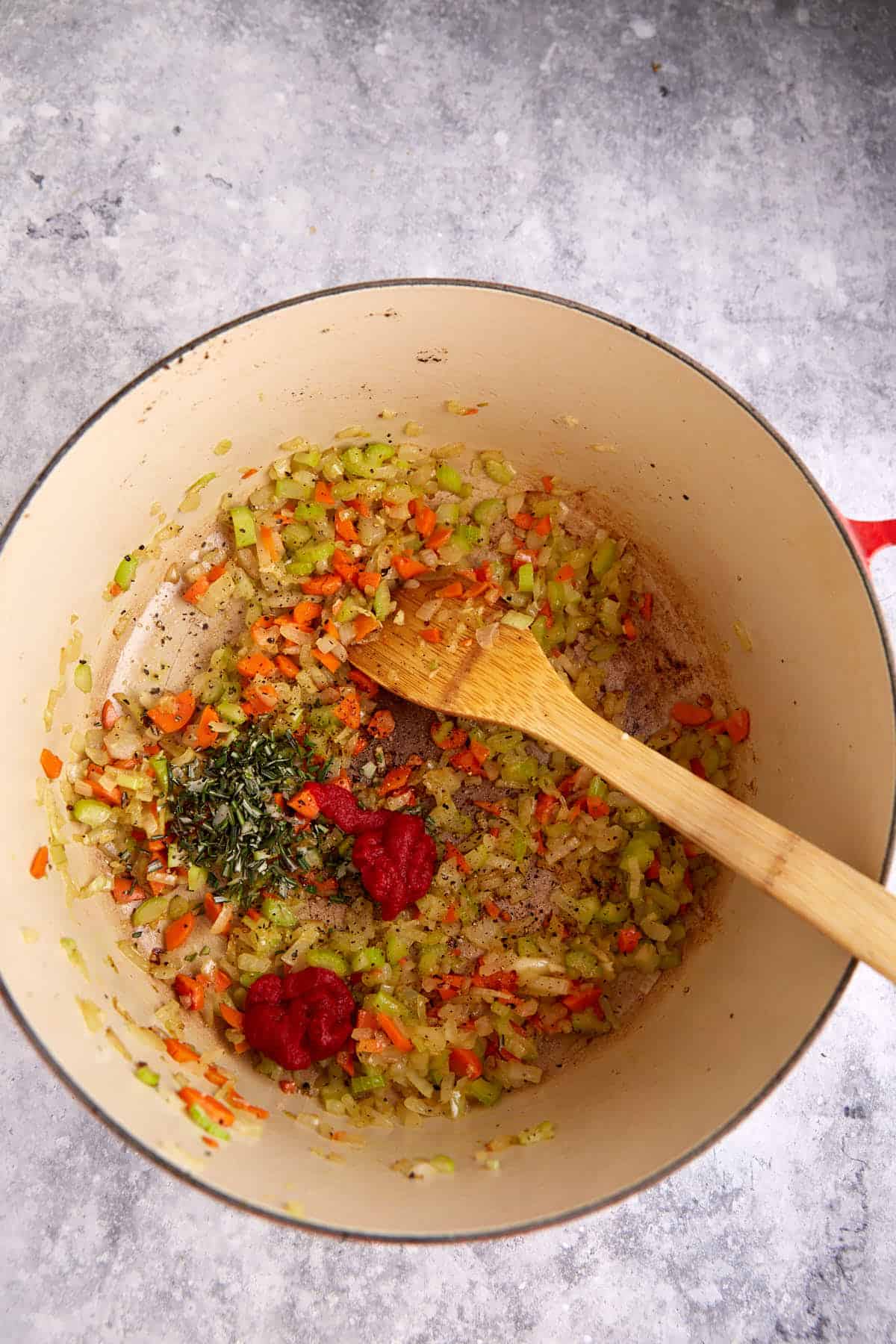 Cooked veggies in a Dutch oven.