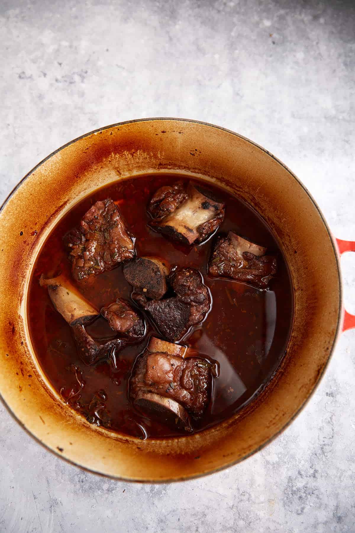Short ribs that have been cooked in a Dutch oven.