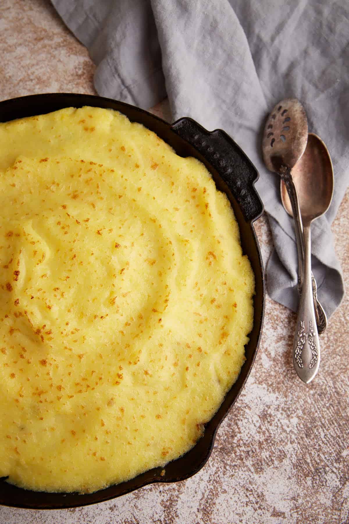 A baked shepherd's pie in an iron skillet.