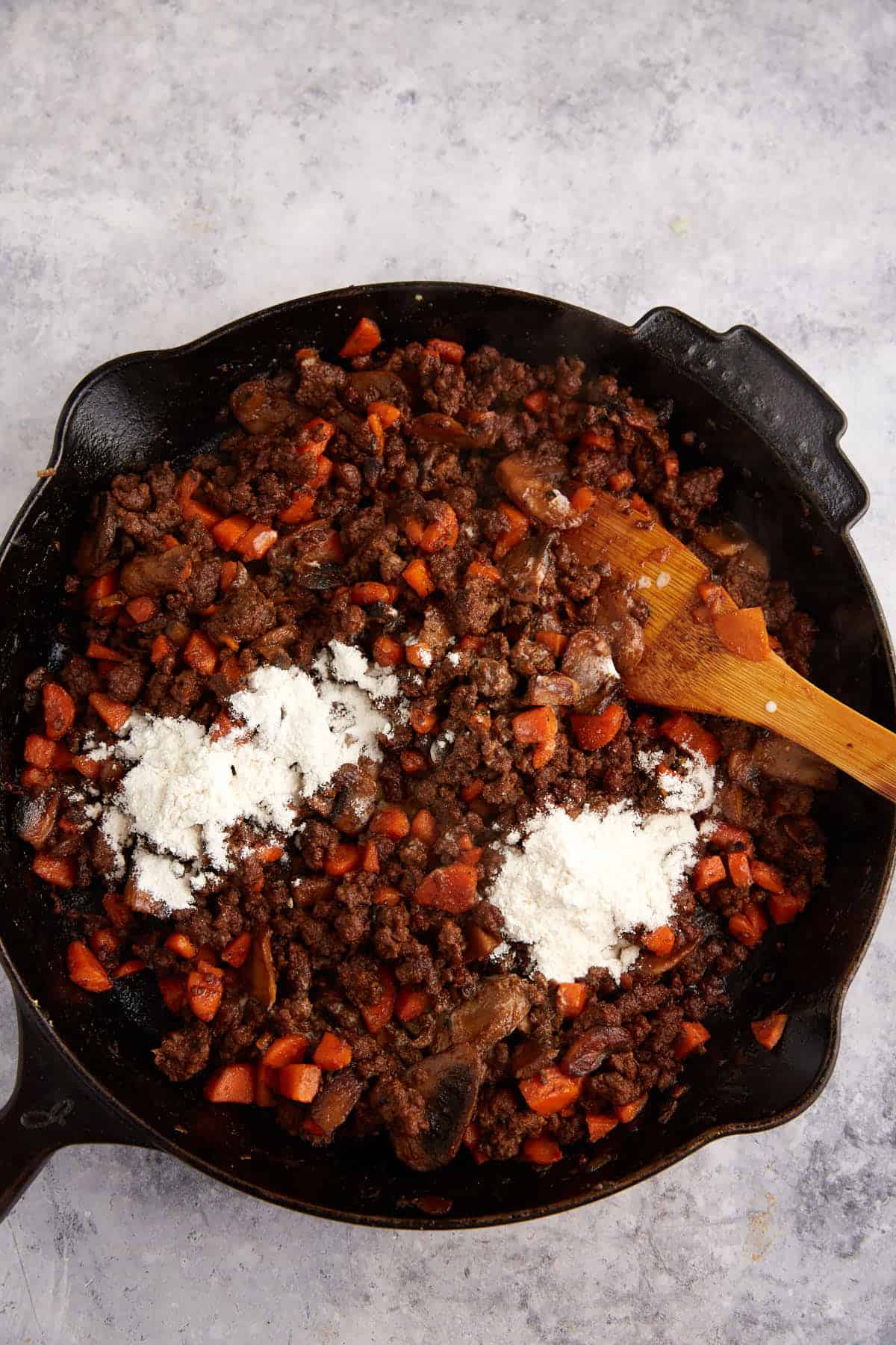 Flour added to ground beef mixture.