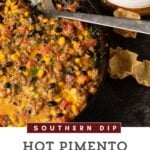 A skillet of hot pimento cheese dip.