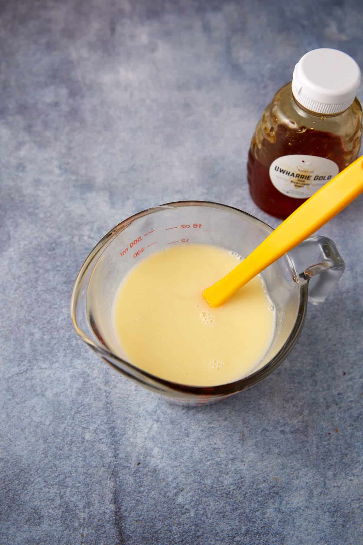 liquid ingredients in a measuring cup.