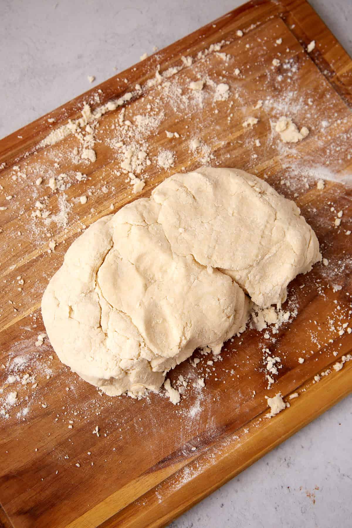 Biscuit dough on a cutting board.