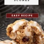 An oatmeal scone broken in half.