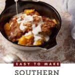 A bowl of peach cobbler with cream being poured over it.