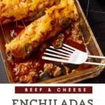 A casserole dish of beef enchiladas with red sauce.