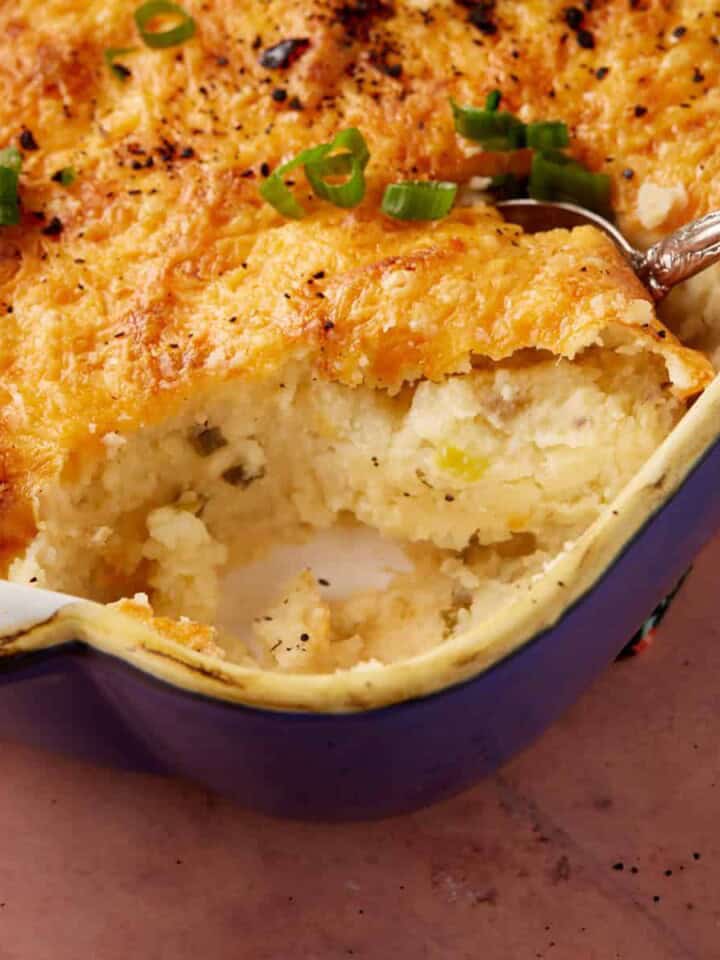 A serving of baked mashed potato casserole.