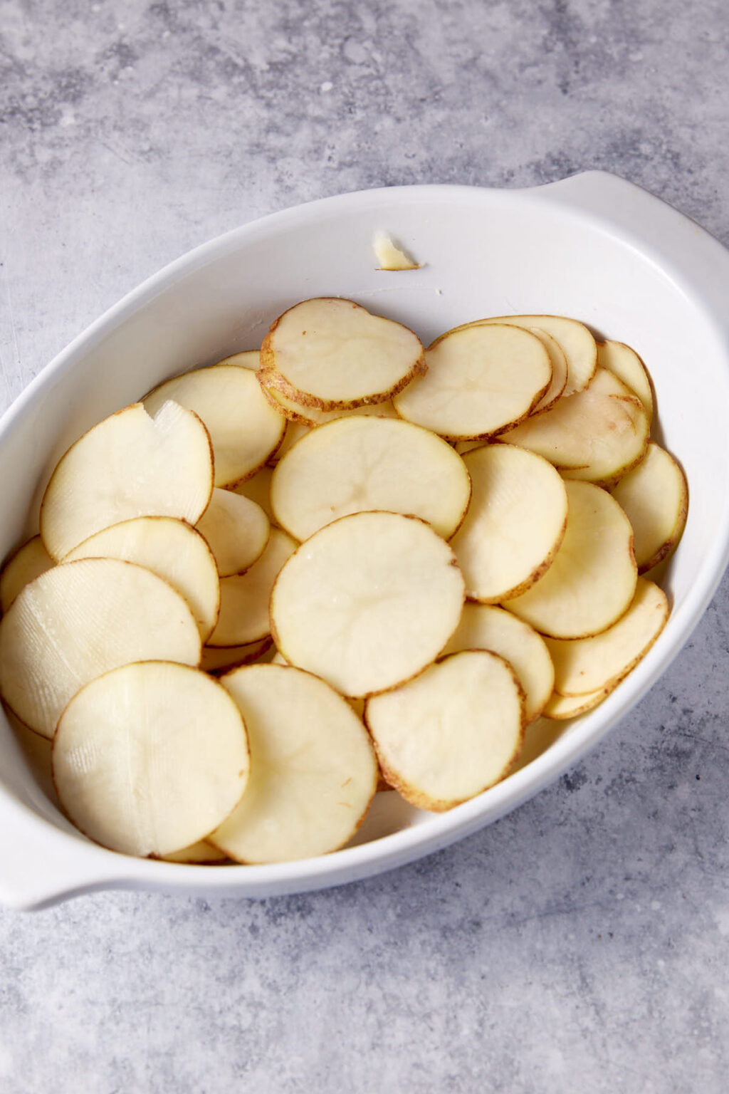 Oven Baked Pork Chops and Potato Casserole - Butter & Baggage