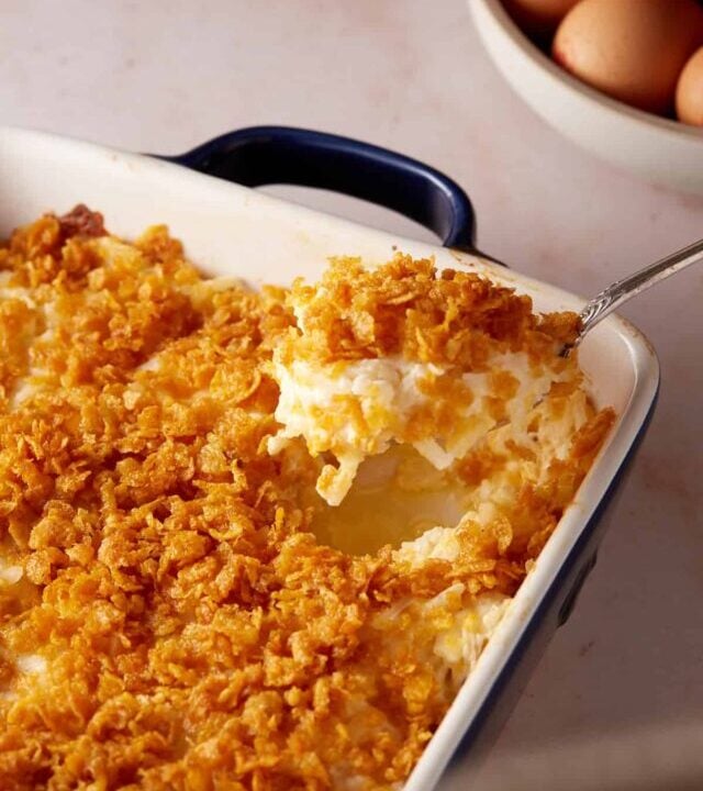 A scoop of creamy hashbrown casserole.