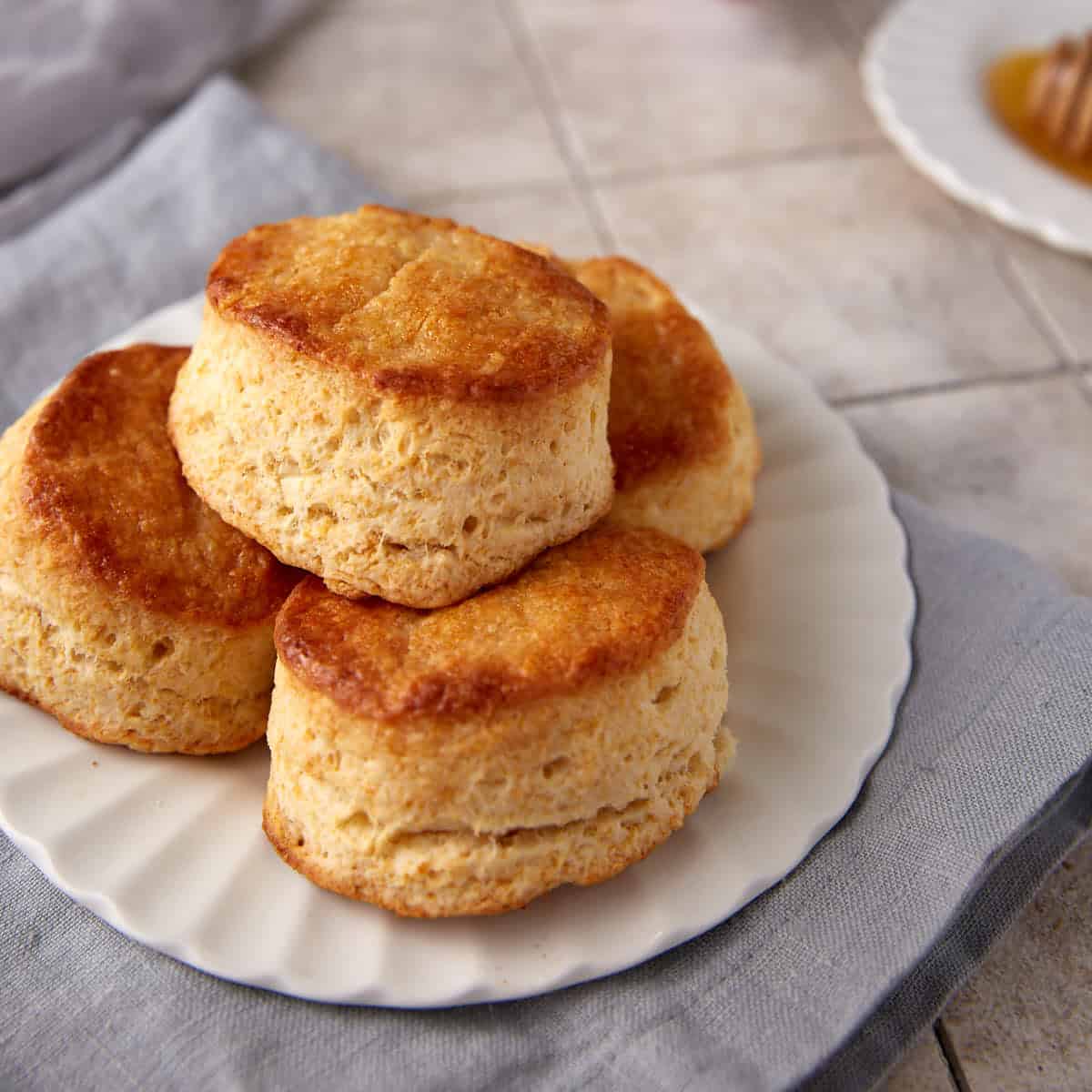 A plate of honey butter biscuits.