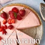 A strawberry Pie cut into slices.