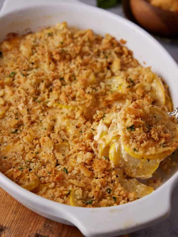 A scoop of summer squash casserole.