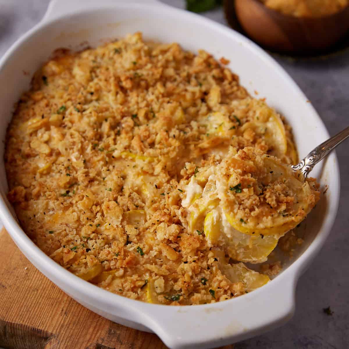 A scoop of summer squash casserole.