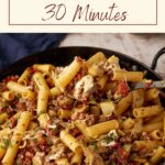 A skillet of Sun-Dried Tomato Pasta with Artichokes