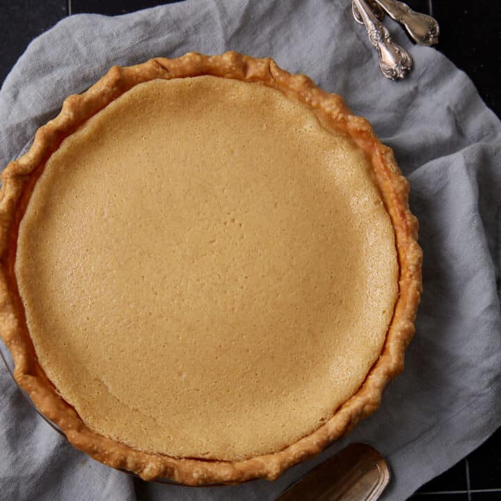 An entire buttermilk pie before it has been cut.
