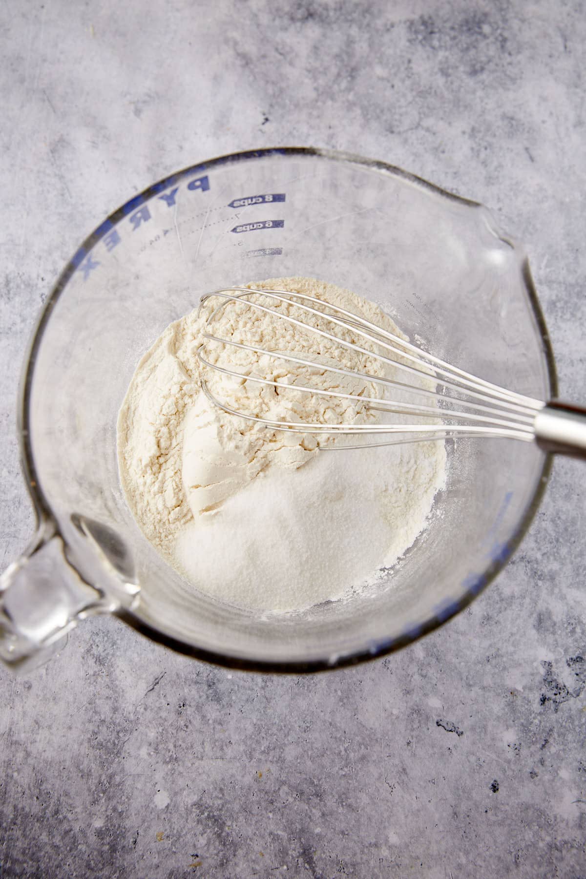 The dry ingredients to make waffles in a bowl.