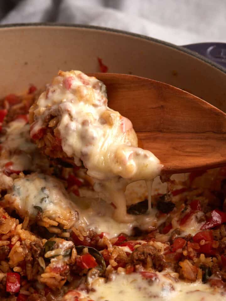 A cheesy scoop of hamburger casserole.